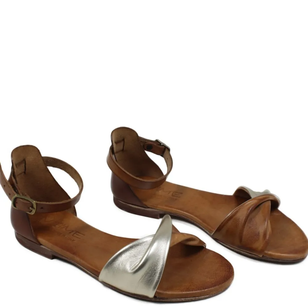 sandali_bassi_flat_in_pel_0.webp Sandali Bassi | In Time Sandali Bassi Flat in Pelle "Procida" - /Platino Cuoio